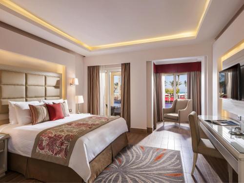 Postel nebo postele na pokoji v ubytování Rixos Premium Seagate