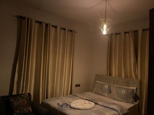 Ένα ή περισσότερα κρεβάτια σε δωμάτιο στο Lushoto Retreat