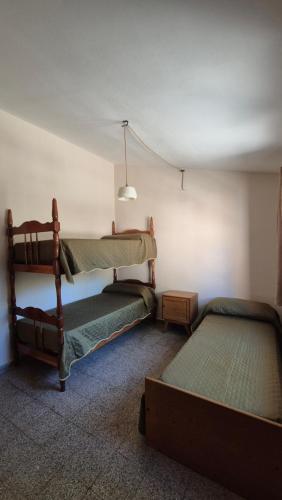 Postel nebo postele na pokoji v ubytování Cabaña Zorro Verde