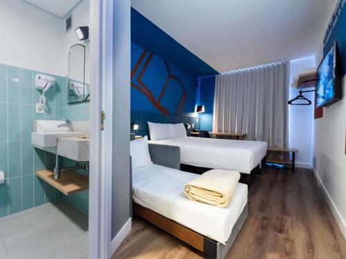 Un baño de ibis Styles Poços de Caldas