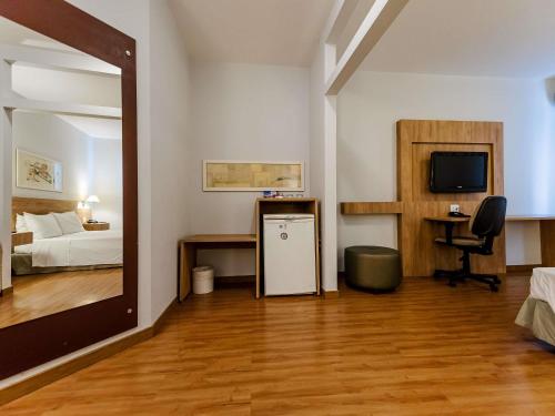 Postel nebo postele na pokoji v ubytování Ibis Styles Campinas Alphaville