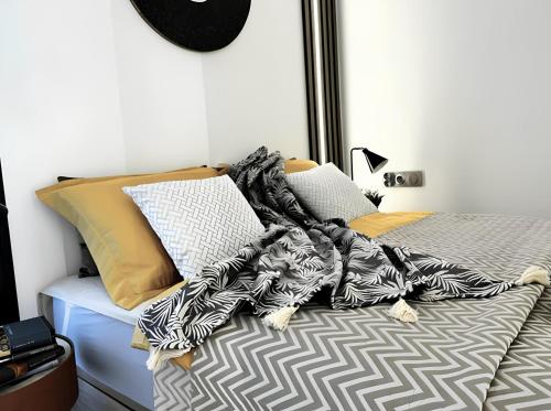 En eller flere senge i et værelse på Elegance Primavera Apartment Costa del Silencio