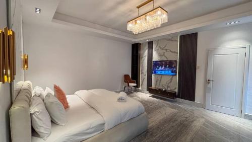 Postel nebo postele na pokoji v ubytování Sujimoto Residences MacDonald