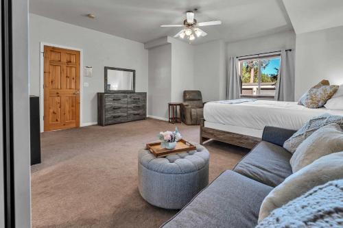a living room with a bed and a couch at 2BDR Condo - Three Minutes to Olympic Valley! in Tahoe City