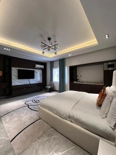TV a/nebo společenská místnost v ubytování Sujimoto Residences MacDonald