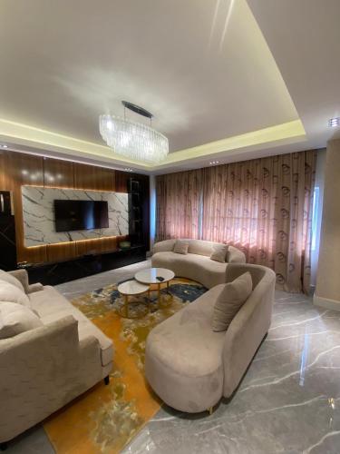 Posezení v ubytování Sujimoto Residences MacDonald
