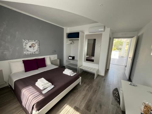 Postel nebo postele na pokoji v ubytování AleVa b&b