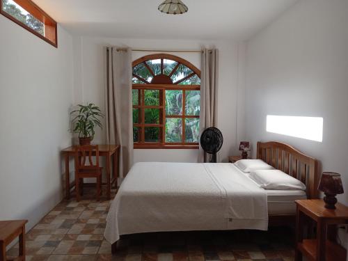 Llit o llits en una habitació de Banana Lodge