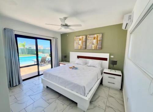 Postel nebo postele na pokoji v ubytování Villa Orleans - Casa Linda, Sosua