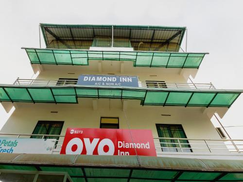 a building with a sign on the side of it at Super Hotel O Diamond In in Cochin