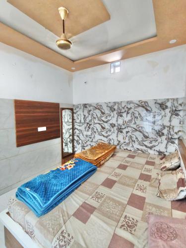 Ένα ή περισσότερα κρεβάτια σε δωμάτιο στο Hotel sagar palace