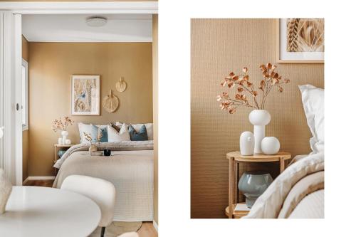 a bedroom with a bed and a table at Barfot Apartment - Bergen City center in Bergen