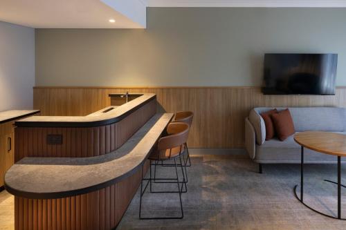 Телевизор и/или развлекательный центр в Novotel Sydney City Centre