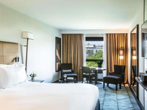 Postel nebo postele na pokoji v ubytování Sofitel Lisbon Liberdade