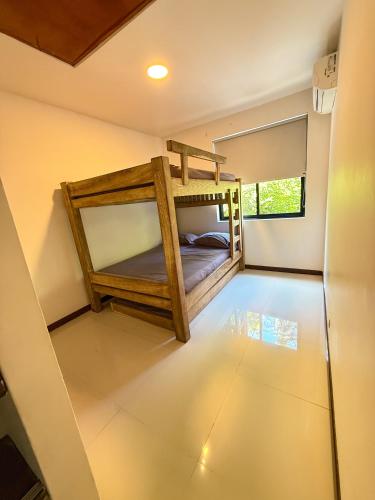 a room with two bunk beds in it at Cabaña en santafe de Antioquia in Santa Fe de Antioquia