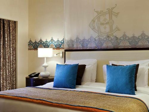 Кровать или кровати в номере Sofitel Legend Old Cataract