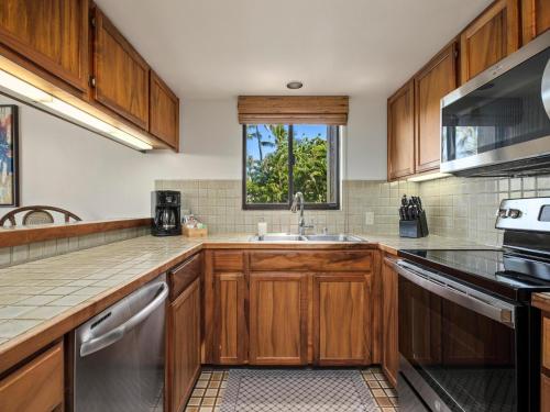 Køkken eller tekøkken på Polo Beach Club 206