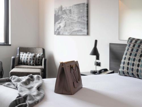 Ένα ή περισσότερα κρεβάτια σε δωμάτιο στο Mercure Sydney