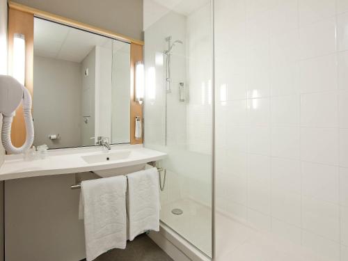 Ванная комната в ibis Paris Pantin Eglise