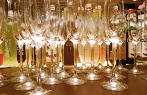 a group of wine glasses sitting on top of a table at Hotel Eifelsteig in Roetgen
