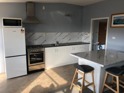 Η κουζίνα ή μικρή κουζίνα στο South Bay Rest