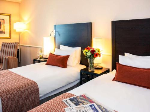 Cama o camas de una habitación en Mercure Johannesburg Midrand