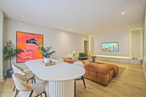 a living room with a couch and a table at The Metropolis Lekki in Lekki