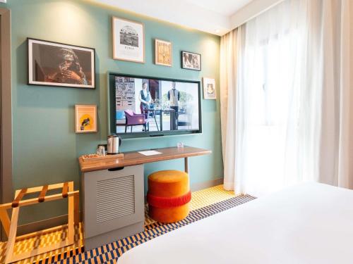 Телевизор и/или развлекательный центр в Mercure Shéhérazade Rabat