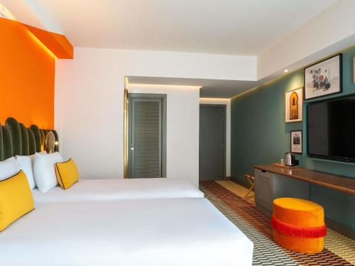 Кровать или кровати в номере Mercure Shéhérazade Rabat