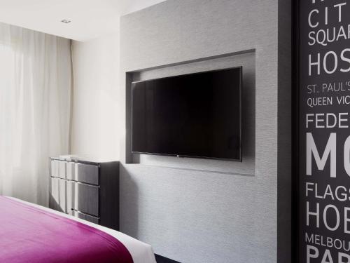 Ένα ή περισσότερα κρεβάτια σε δωμάτιο στο Pullman Melbourne City Centre