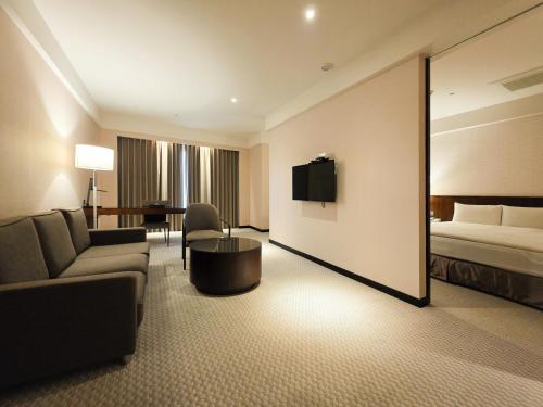 Cama o camas de una habitación en 雀客旅館台中來來