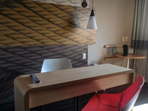 Un lugar para sentarse en ibis Santos Gonzaga Praia