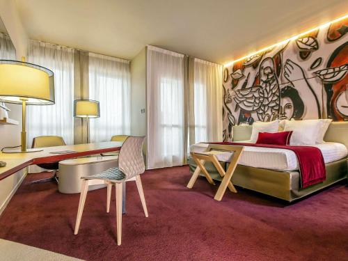 Ένα ή περισσότερα κρεβάτια σε δωμάτιο στο Mercure Limoges Centre