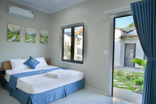 Ένα ή περισσότερα κρεβάτια σε δωμάτιο στο Small House homestay Mộc Châu