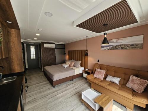 Postel nebo postele na pokoji v ubytování Epic Suite 209 Deluxe Aeropuerto