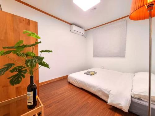 Giường trong phòng chung tại Nuha278