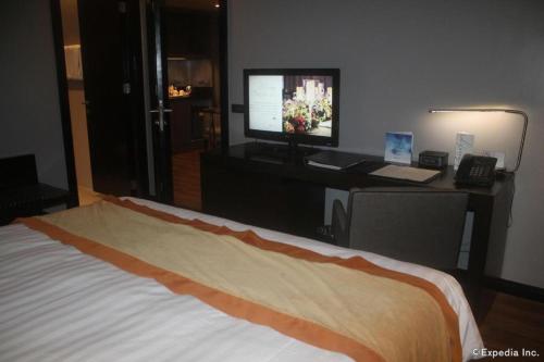 Телевизор и/или развлекательный центр в F1 Hotel Manila