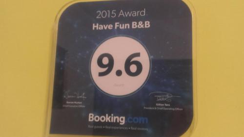 a dvd sign that says have fun bbc booing at Have FUN villa in Hengchun