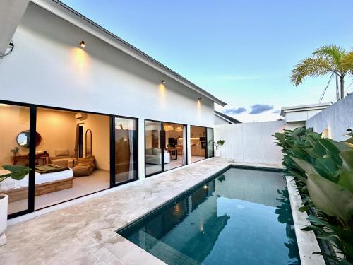 an image of a swimming pool in a house at Villas Topazio and Opalo -- Gateway to Uluwatu beaches in Uluwatu