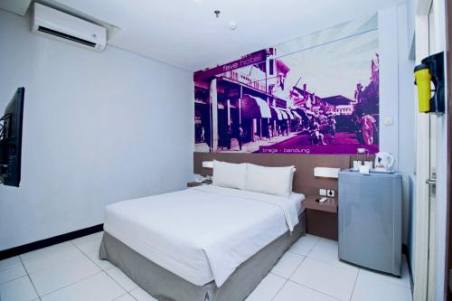 Ένα ή περισσότερα κρεβάτια σε δωμάτιο στο favehotel Braga