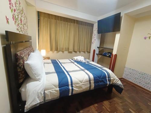 Ένα ή περισσότερα κρεβάτια σε δωμάτιο στο Yanuy Culinary Stay and Taste