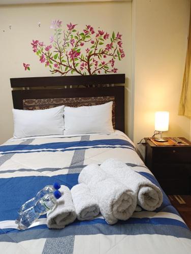 Ένα ή περισσότερα κρεβάτια σε δωμάτιο στο Yanuy Culinary Stay and Taste
