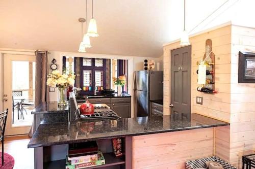 a kitchen with a counter top and a refrigerator at 826 Wilson Road in Highlands