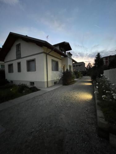 a house with a road in front of it at CasaNobile -Suite Il Melo in Merate