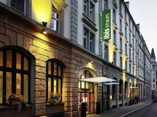 a building with a sign on the side of it at ibis Styles Luzern in Luzern