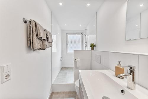 Ένα μπάνιο στο Work & Stay - Apartment mit Office