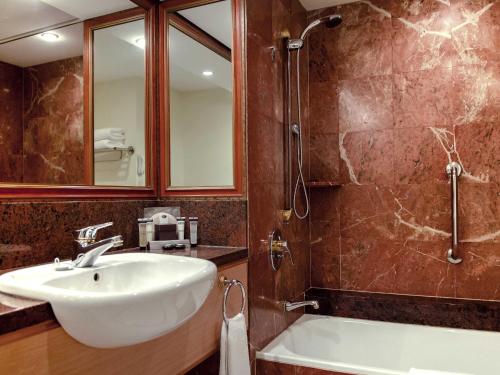 Un baño de Pullman Cairns International