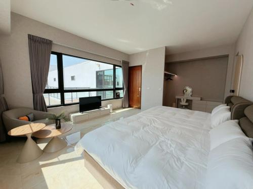 Una cama o camas en una habitación de 湛湛里煙