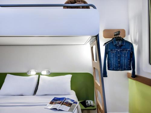 Кровать или кровати в номере ibis budget Porto Alegre - Super Econômico