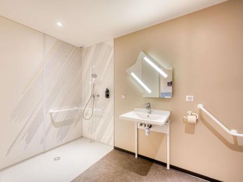 Koupelna v ubytování ibis budget Versailles - Trappes